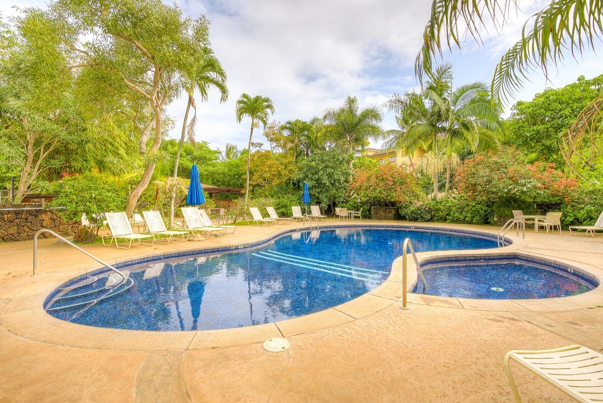 2721 Poipu Road, Unit 420 Koloa, HI 96756 - Photo 21 of 26 a view of a swimming pool with a yard