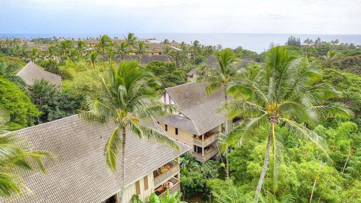 2721 Poipu Road, Unit 420 Koloa, HI 96756 - Photo 23 of 26 a view of a swimming pool with a yard