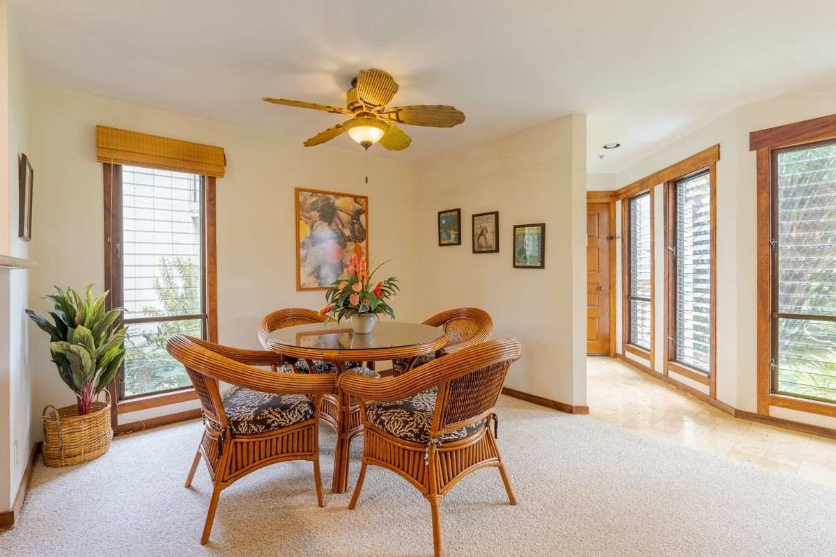 2721 Poipu Road, Unit 420 Koloa, HI 96756 - Photo 5 of 26 a view of a dining room with furniture and a window