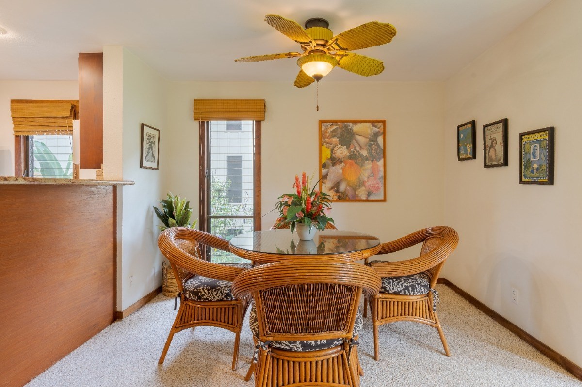 2721 Poipu Road, Unit 420 Koloa, HI 96756 - Photo 6 of 26 a dining room with furniture and window
