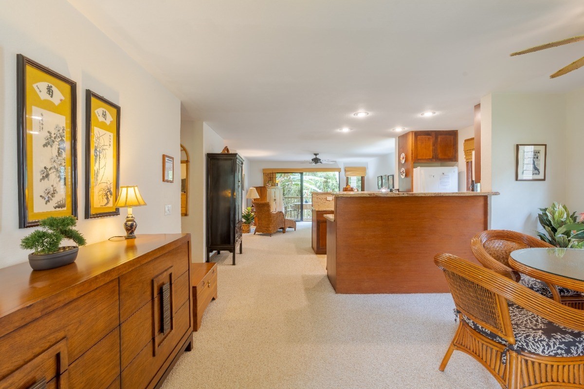 2721 Poipu Road, Unit 420 Koloa, HI 96756 - Photo 7 of 26 a large white kitchen with a large window