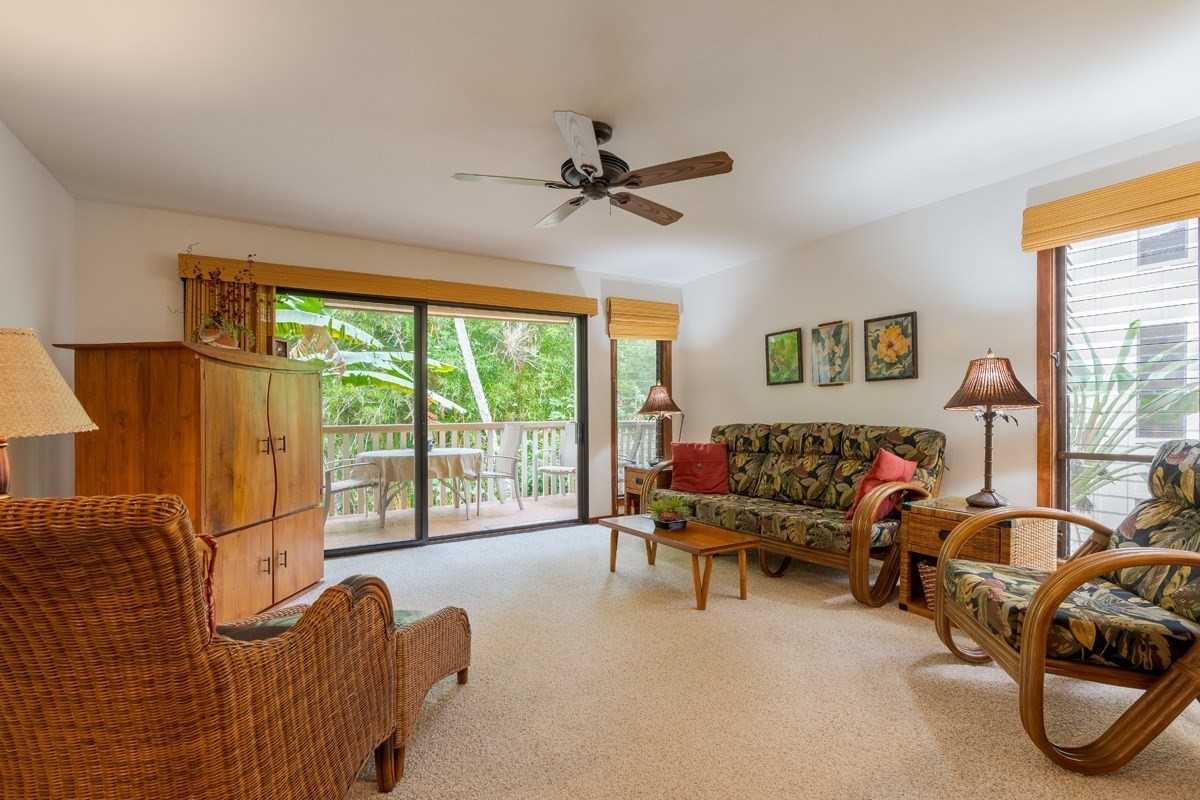 2721 Poipu Road, Unit 420 Koloa, HI 96756 - Photo 8 of 26 a living room with furniture and a large window