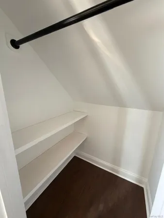a view of small space with racks on the wall
