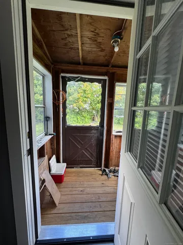 a view of balcony and furniture
