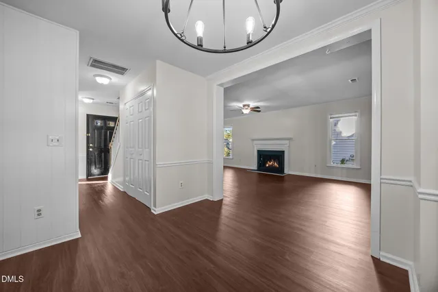 a view of livingroom with furniture wooden floor and window