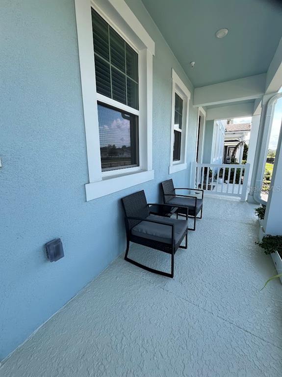4208 Sadler Road Apopka, FL 32712 - Photo 3 of 7 a living room with furniture and a window