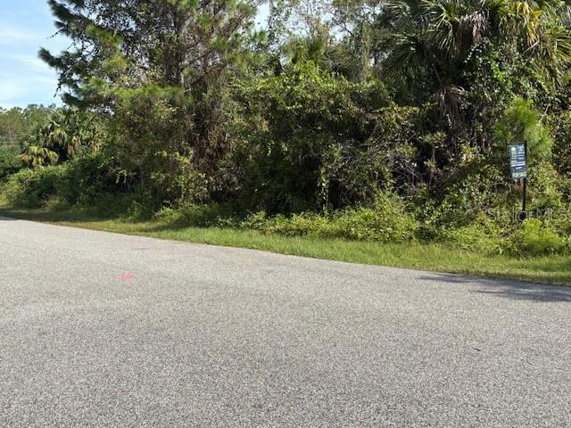 a view of a backyard of a house