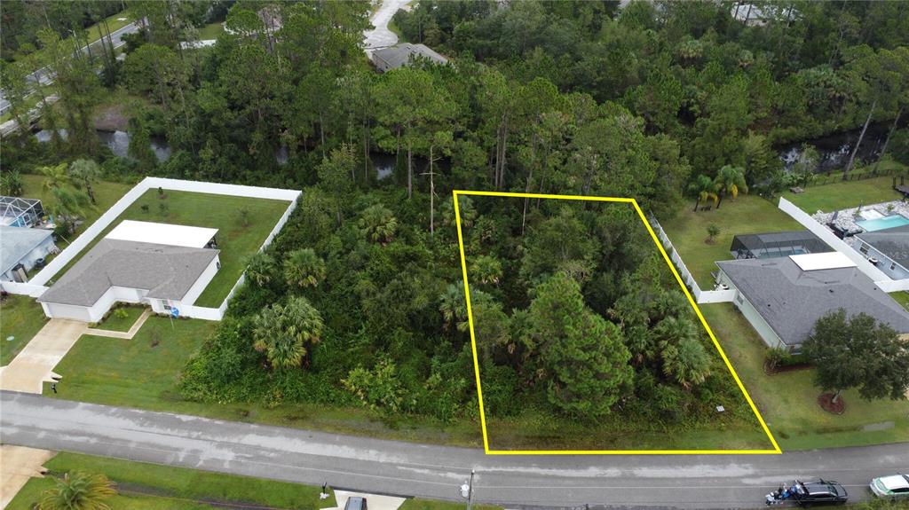 98 Sloganeer Trail Palm Coast, FL 32164 - Photo 2 of 7 an aerial view of a house