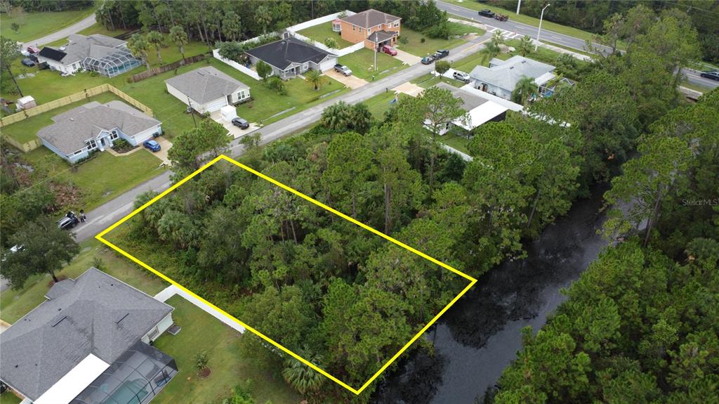98 Sloganeer Trail Palm Coast, FL 32164 - Photo 5 of 7 an aerial view of swimming pool