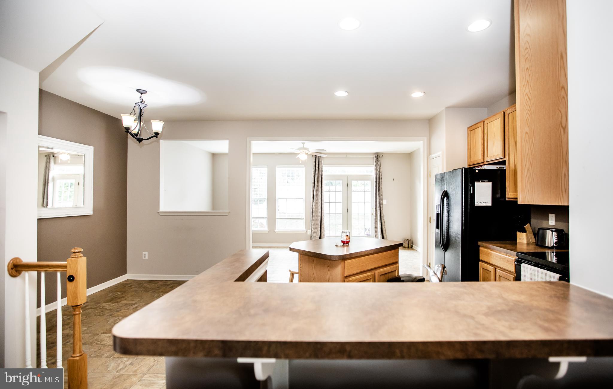 133 Riparian Lane Ranson, WV 25438 - Photo 12 of 43 View to kitchen from living room