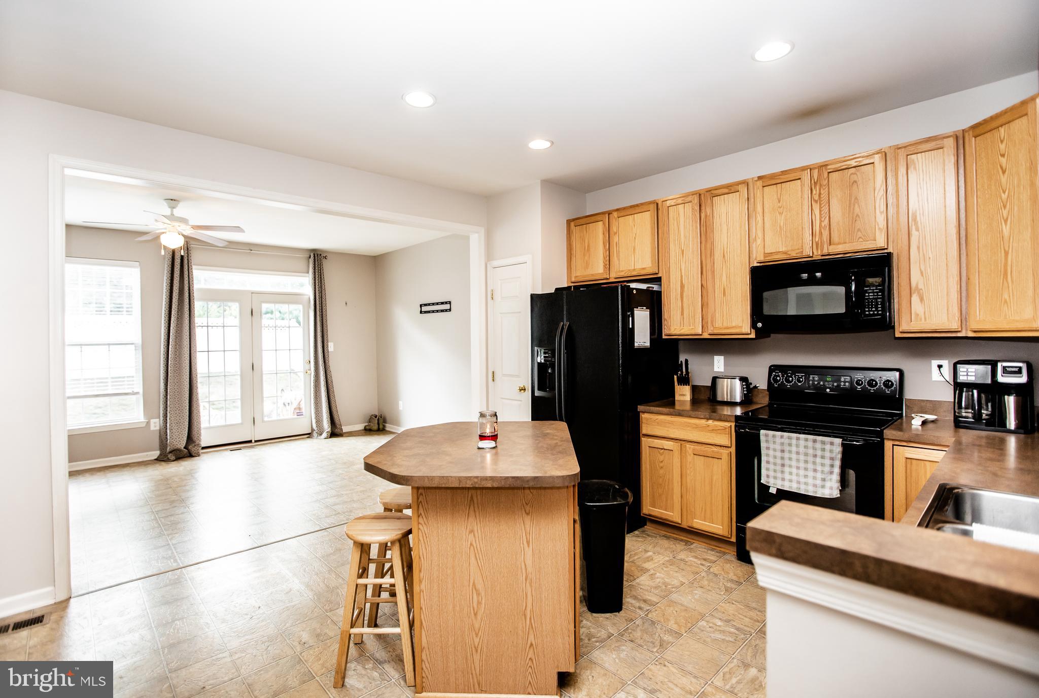 133 Riparian Lane Ranson, WV 25438 - Photo 15 of 43 Kitchen opens to family room