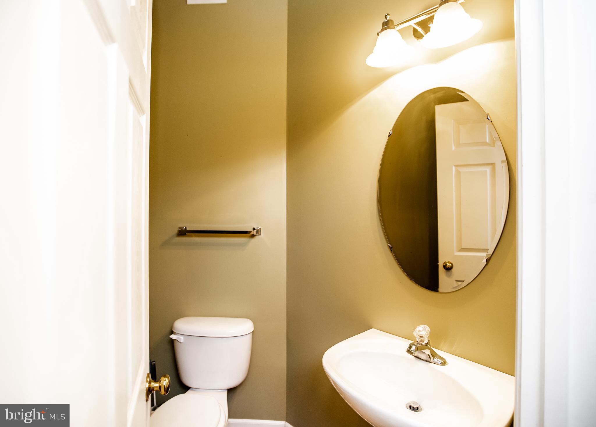 133 Riparian Lane Ranson, WV 25438 - Photo 8 of 43 Half bath for convenience