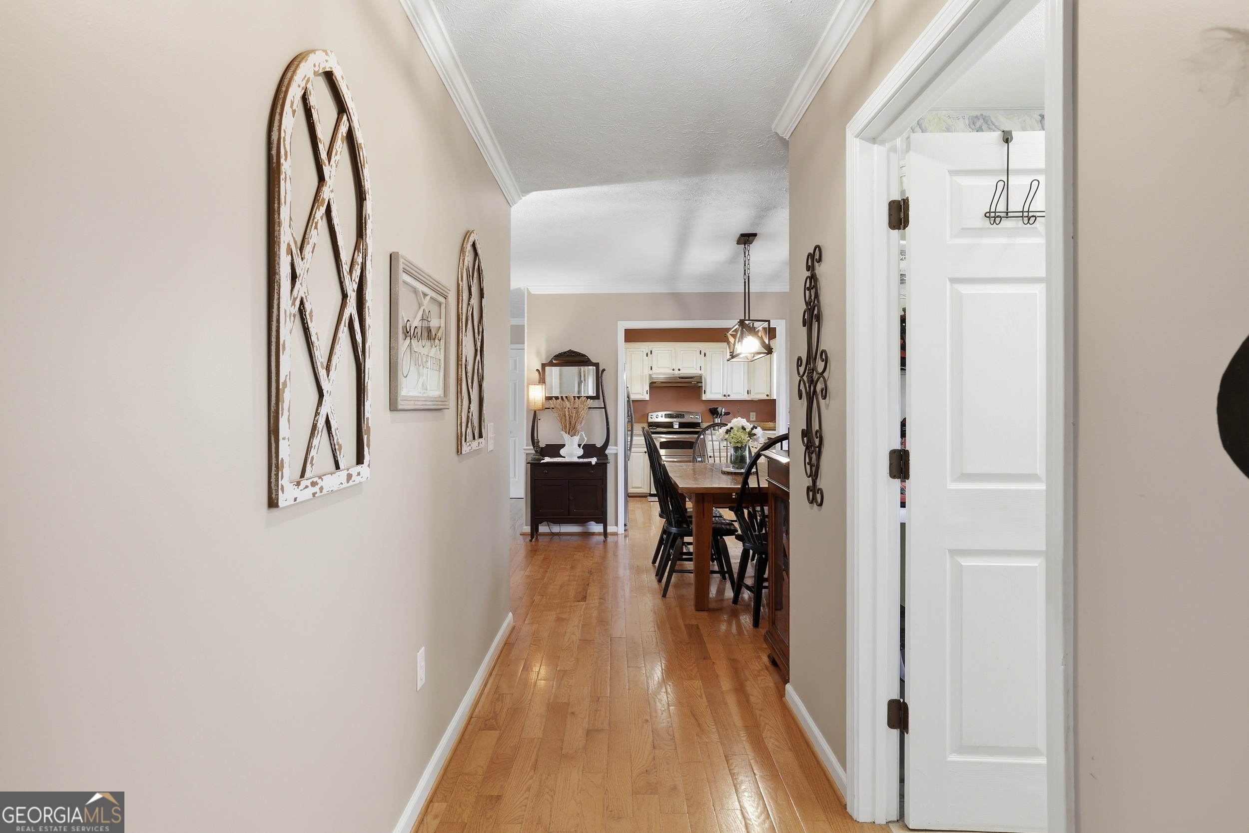 81 McMurray Road Toccoa, GA 30577 - Photo 21 of 50 a view of a hallway with wooden floor and a bathroom