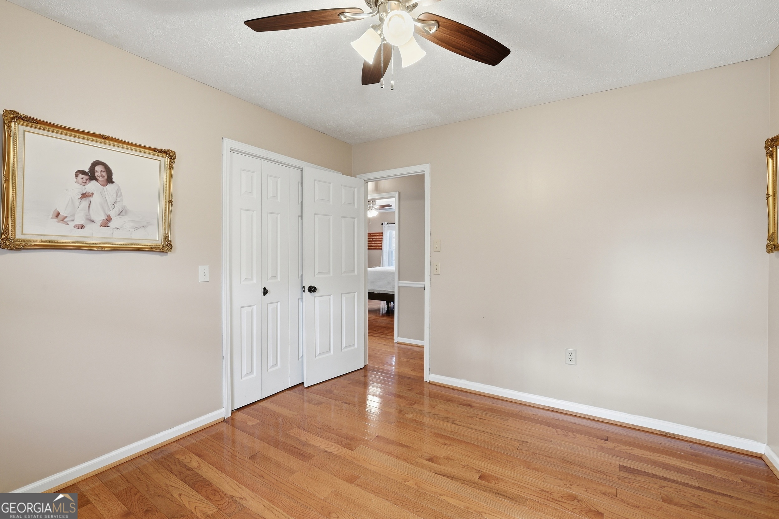 81 McMurray Road Toccoa, GA 30577 - Photo 25 of 50 a view of an empty room with wooden floor