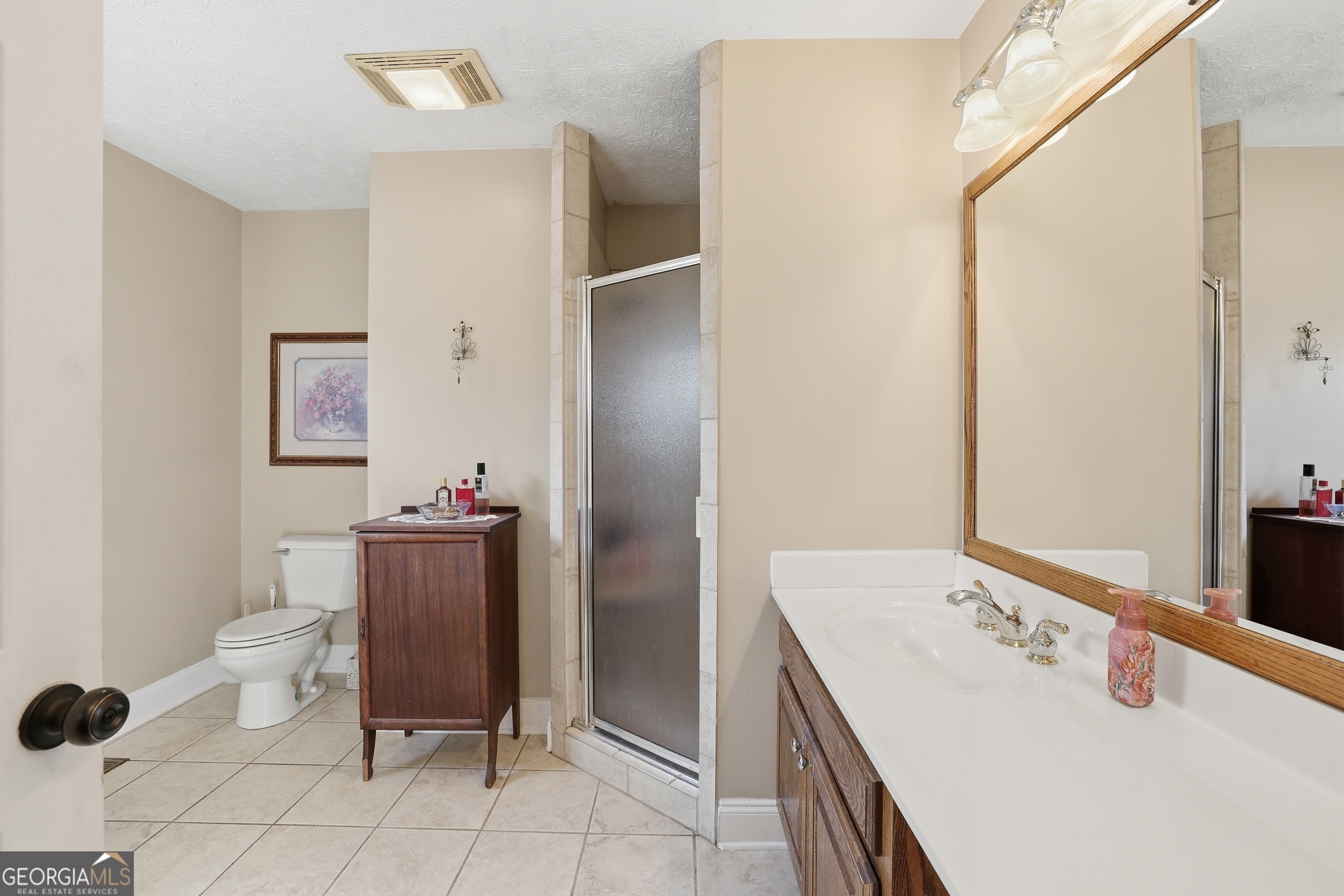 81 McMurray Road Toccoa, GA 30577 - Photo 35 of 50 a bathroom with a sink and a washing machine