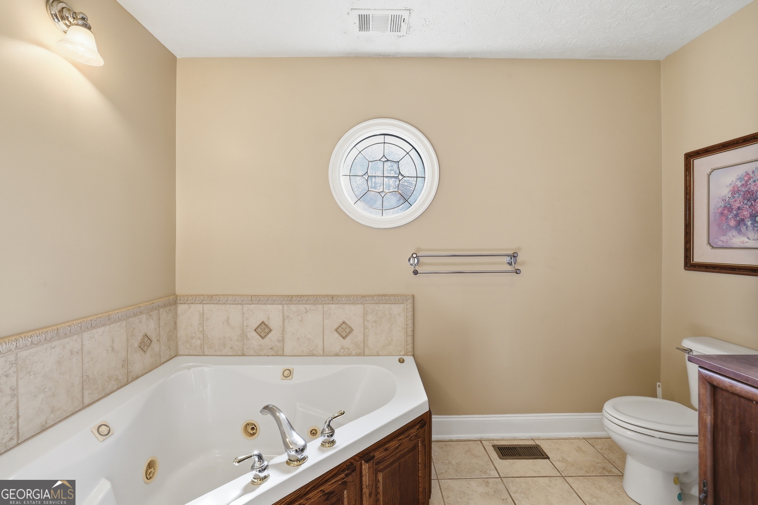 81 McMurray Road Toccoa, GA 30577 - Photo 36 of 50 a bathroom with a bathtub and a toilet