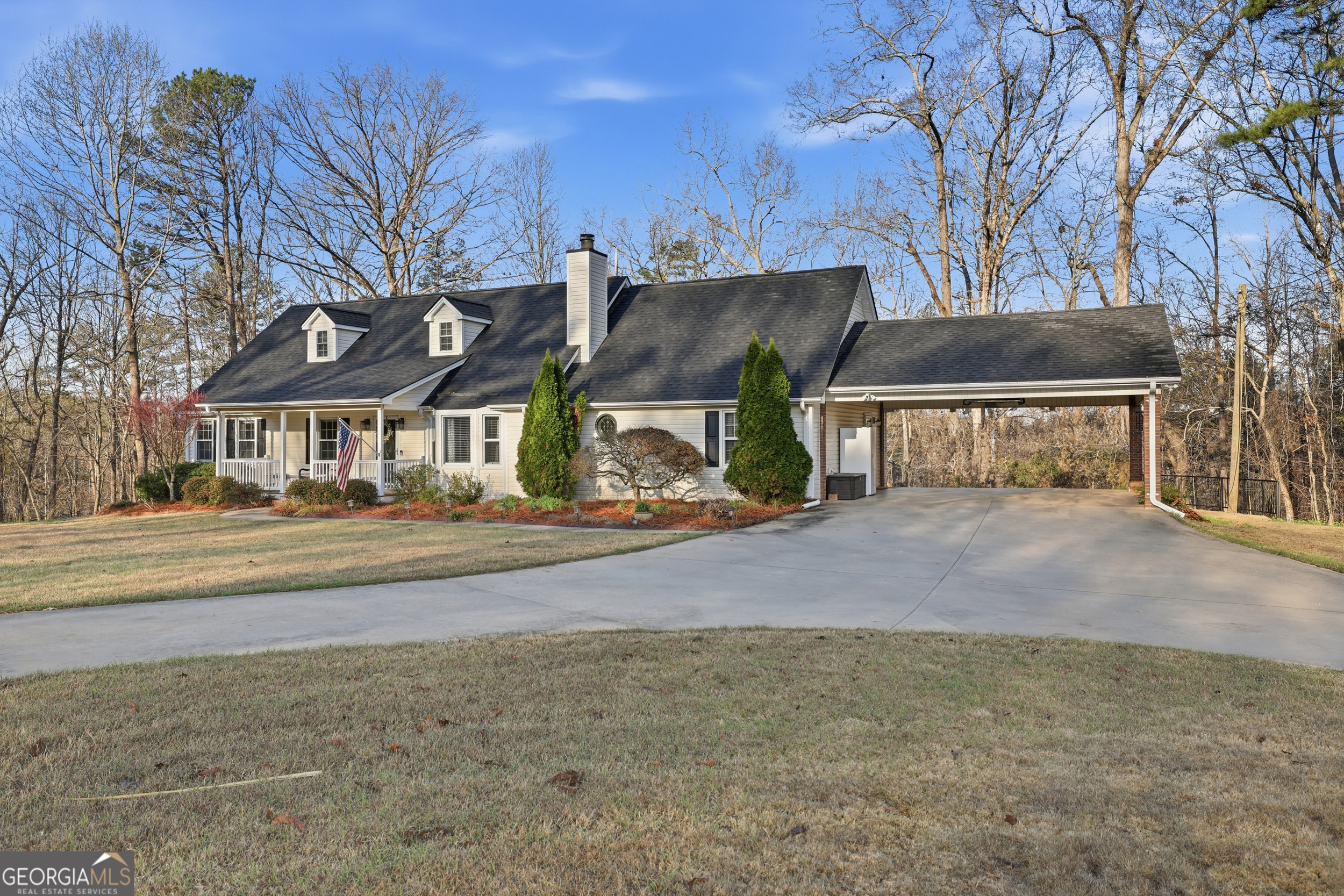 81 McMurray Road Toccoa, GA 30577 - Photo 4 of 50 a front view of house with yard and trees in the background