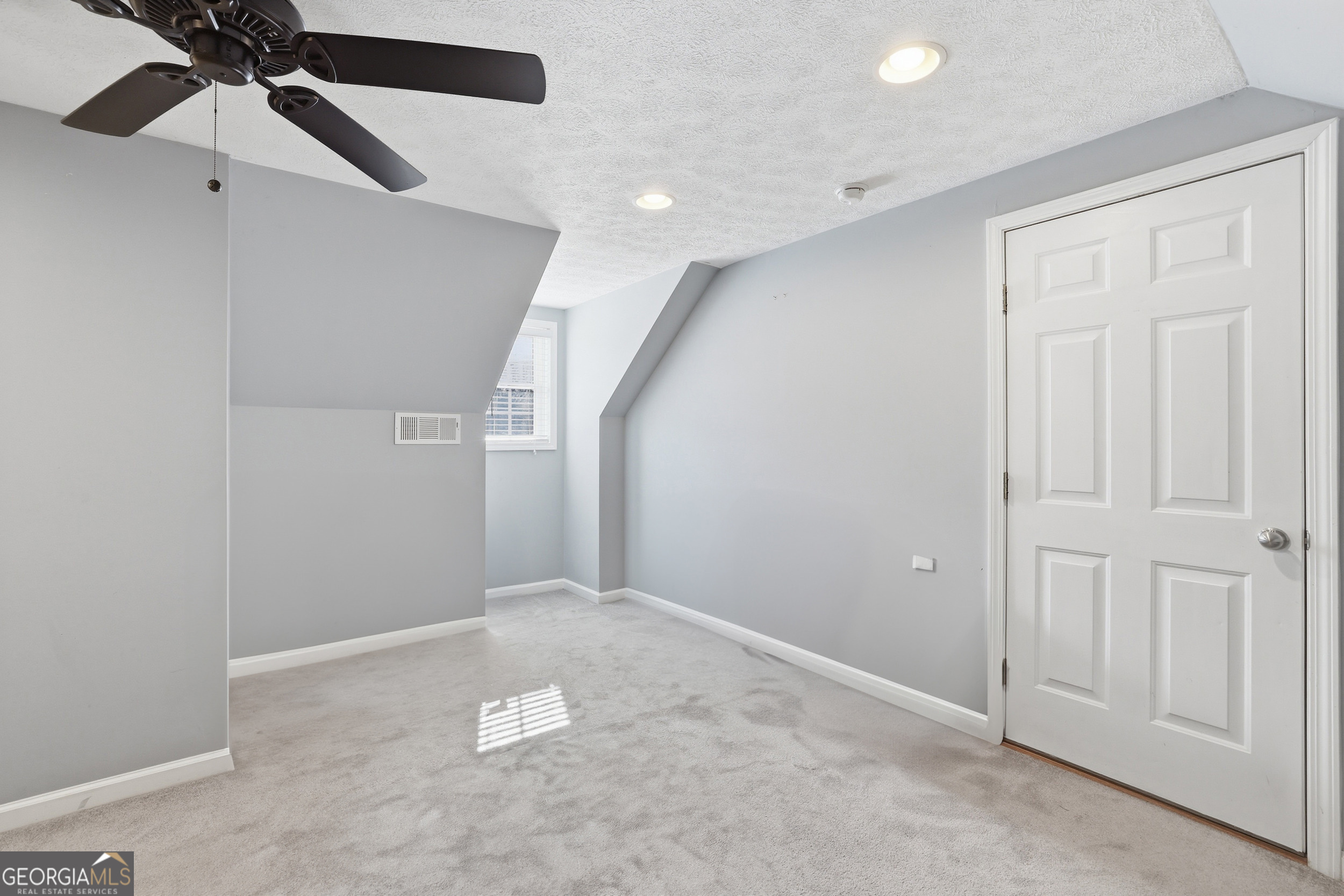 81 McMurray Road Toccoa, GA 30577 - Photo 42 of 50 wooden floor in an empty room with a window