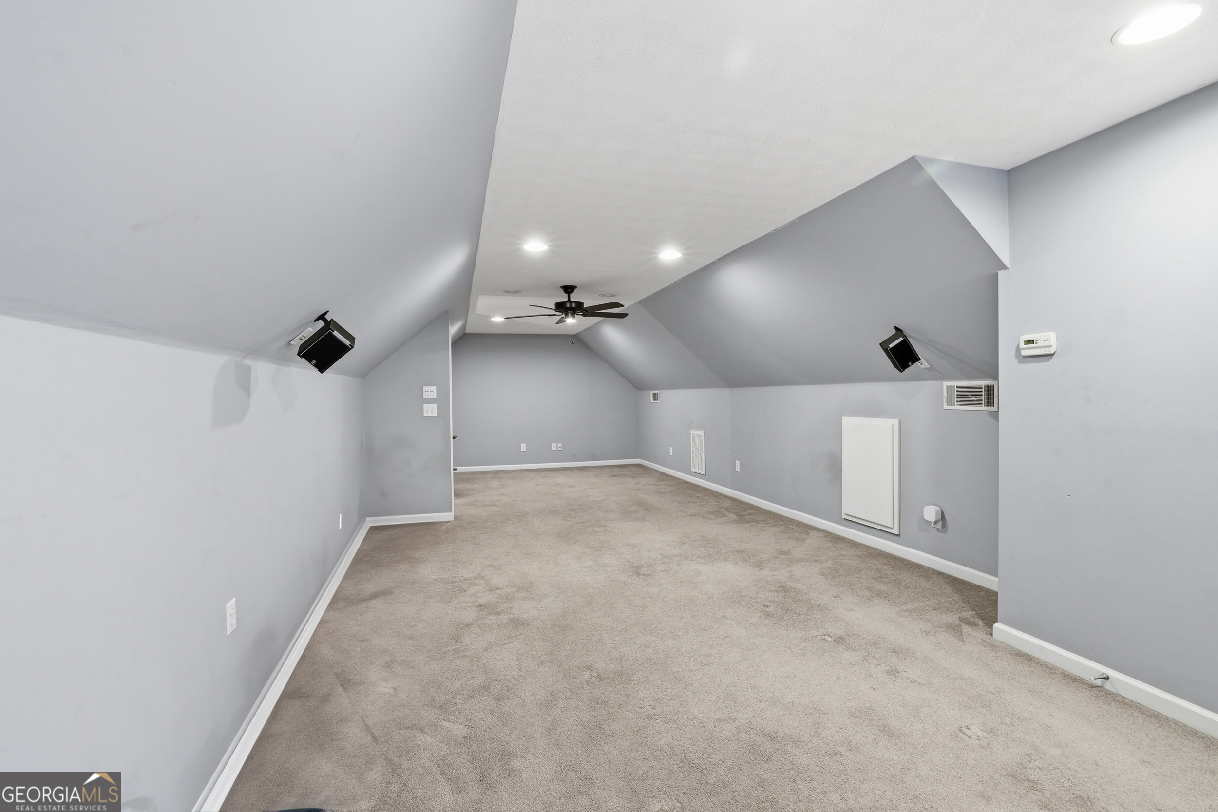 81 McMurray Road Toccoa, GA 30577 - Photo 43 of 50 an empty room with a ceiling fan and a ceiling fan