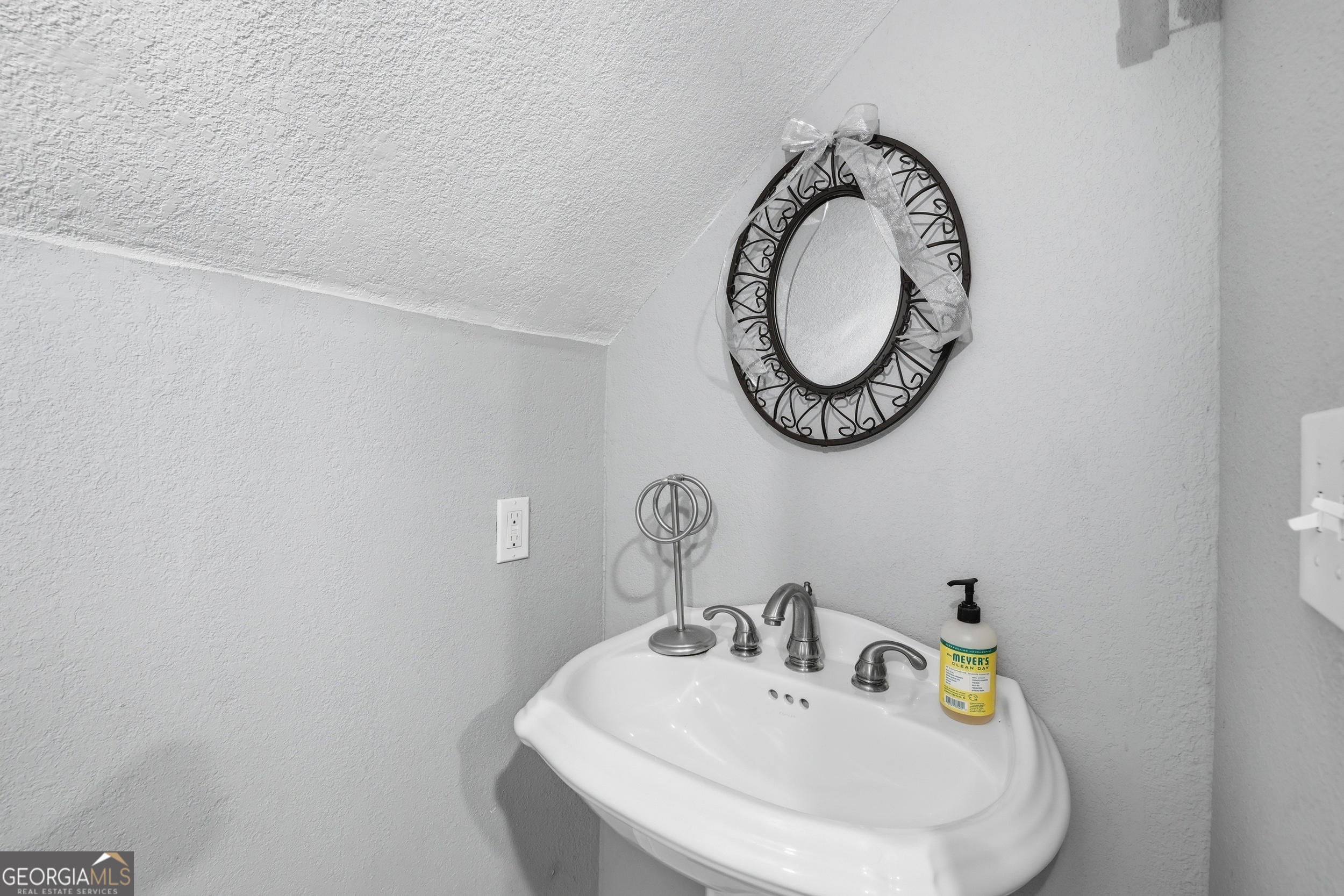 81 McMurray Road Toccoa, GA 30577 - Photo 44 of 50 a bathroom with a sink and a mirror