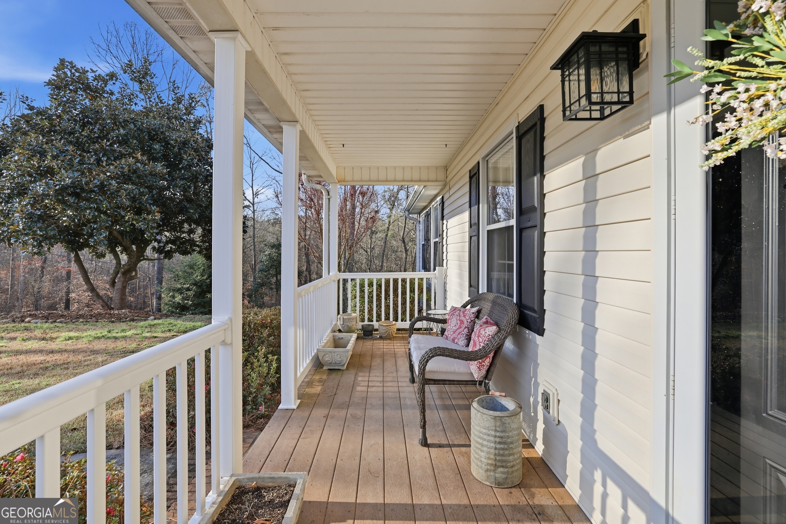 81 McMurray Road Toccoa, GA 30577 - Photo 7 of 50 a balcony with wooden floor table and chairs