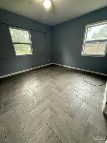 a view of an empty room and window