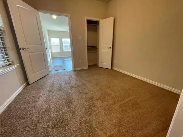 an empty room with window