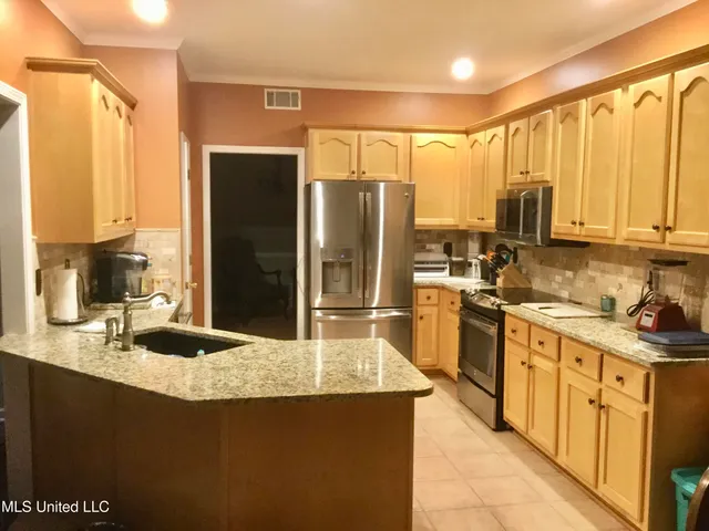 $456,900 | 7684 Rigmoore Point North, Olive Branch, MS 38654