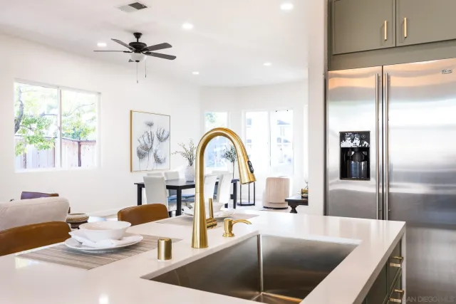 a view of a livingroom with furniture and a window