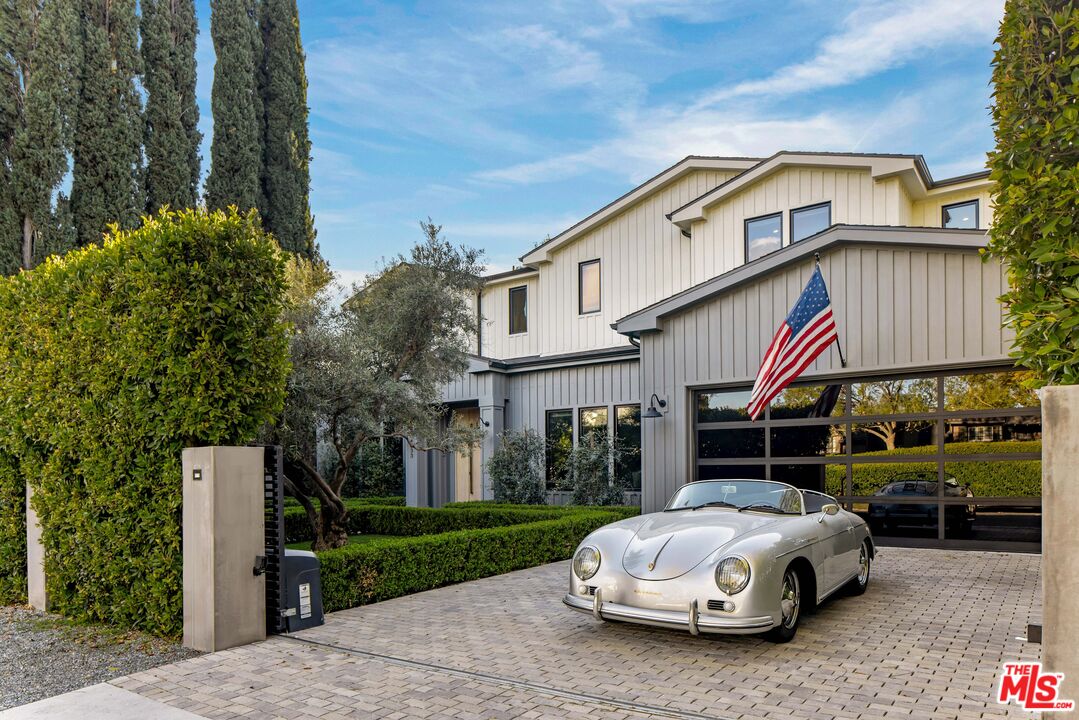 4533 Gentry Avenue Studio City, CA 91607 - Photo 1 of 39 a front view of a house with a garden