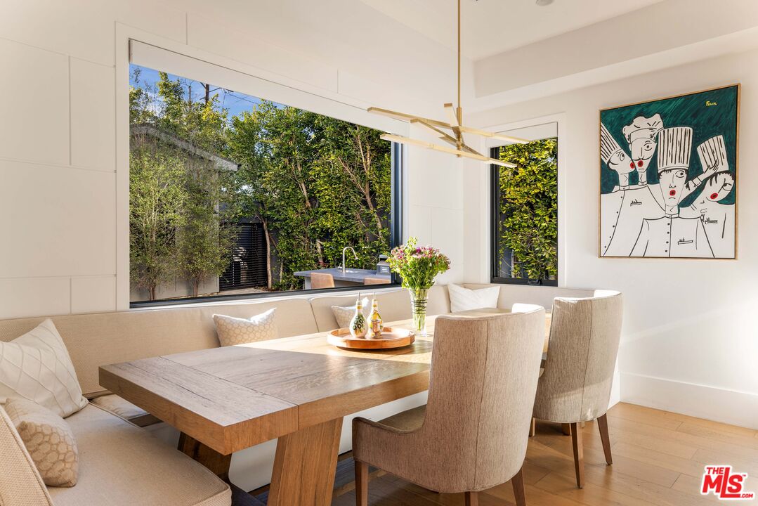 4533 Gentry Avenue Studio City, CA 91607 - Photo 11 of 39 a dining room with furniture and window