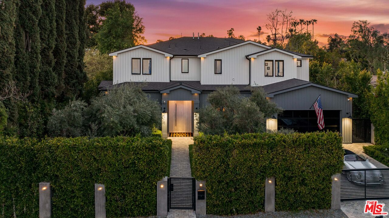 4533 Gentry Avenue Studio City, CA 91607 - Photo 2 of 39 a view of a house with a big yard and large trees