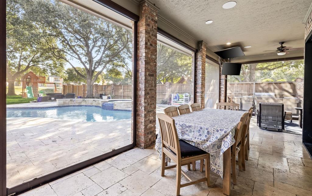 1904 MacGregor Drive Plano, TX 75093 - Photo 30 of 38 View of Patio with Remote-Controlled Shades