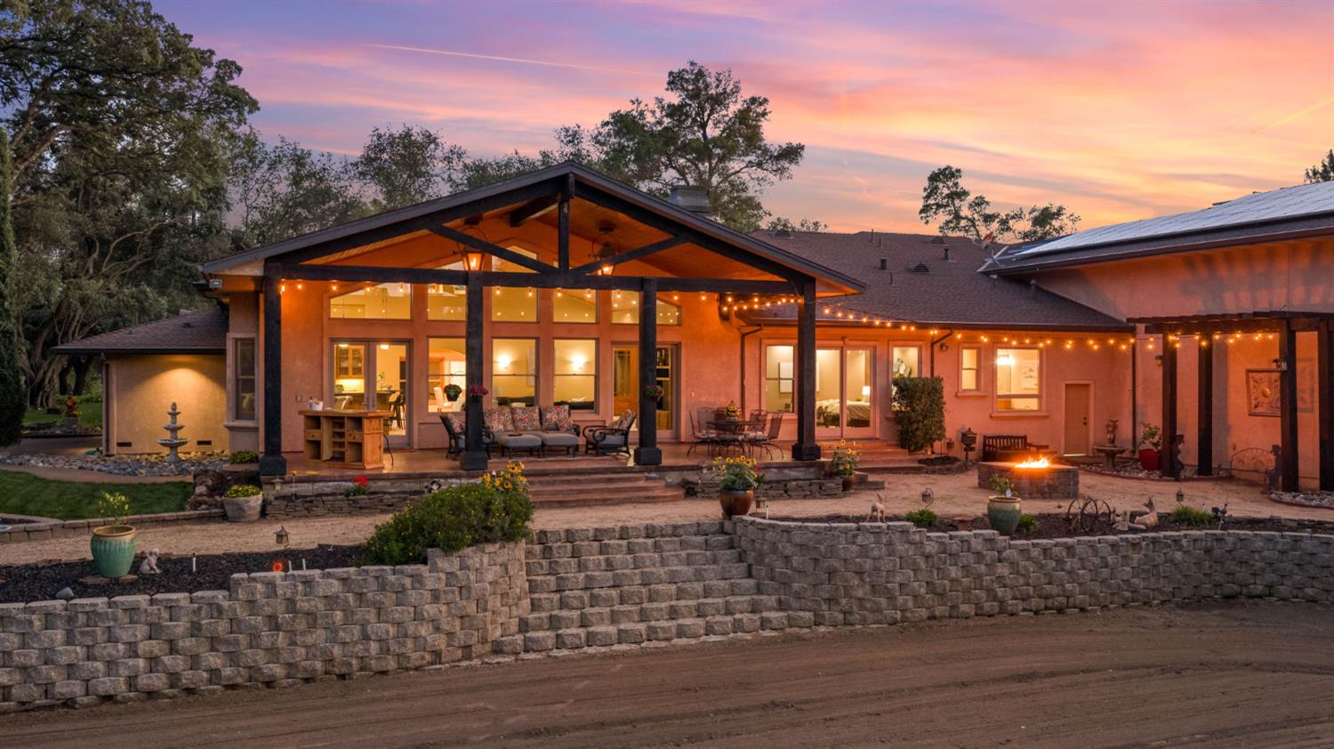 7021 Horseshoe Bar Road Loomis, CA 95650 - Photo 73 of 77 Dramatic timber beams frame expansive windows and seamless outdoor living.