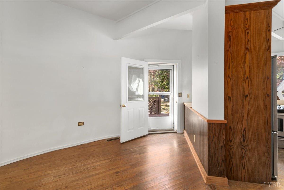 1052 Sardis Road Amherst, VA 24521 - Photo 21 of 46 a view of a hallway with wooden floor and a bathroom