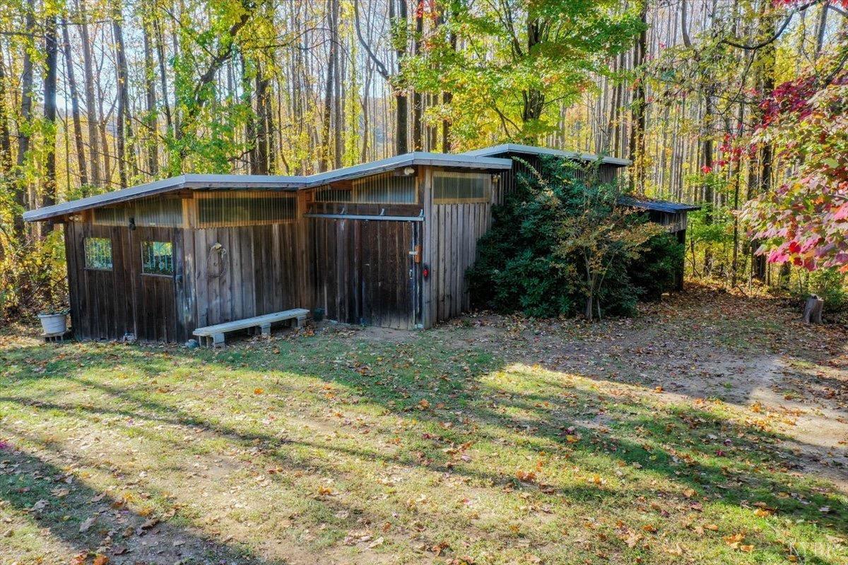 1052 Sardis Road Amherst, VA 24521 - Photo 5 of 46 a backyard of a house with yard and outdoor seating