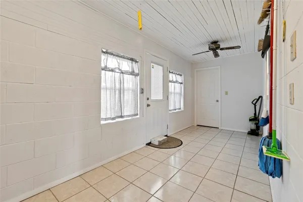 a view of empty room with windows