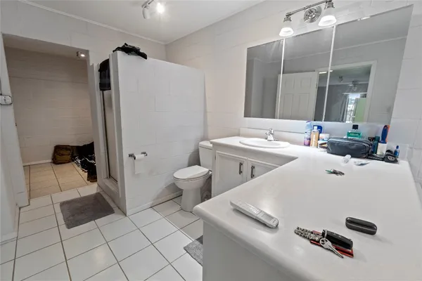 a room with a washing machine and a sink