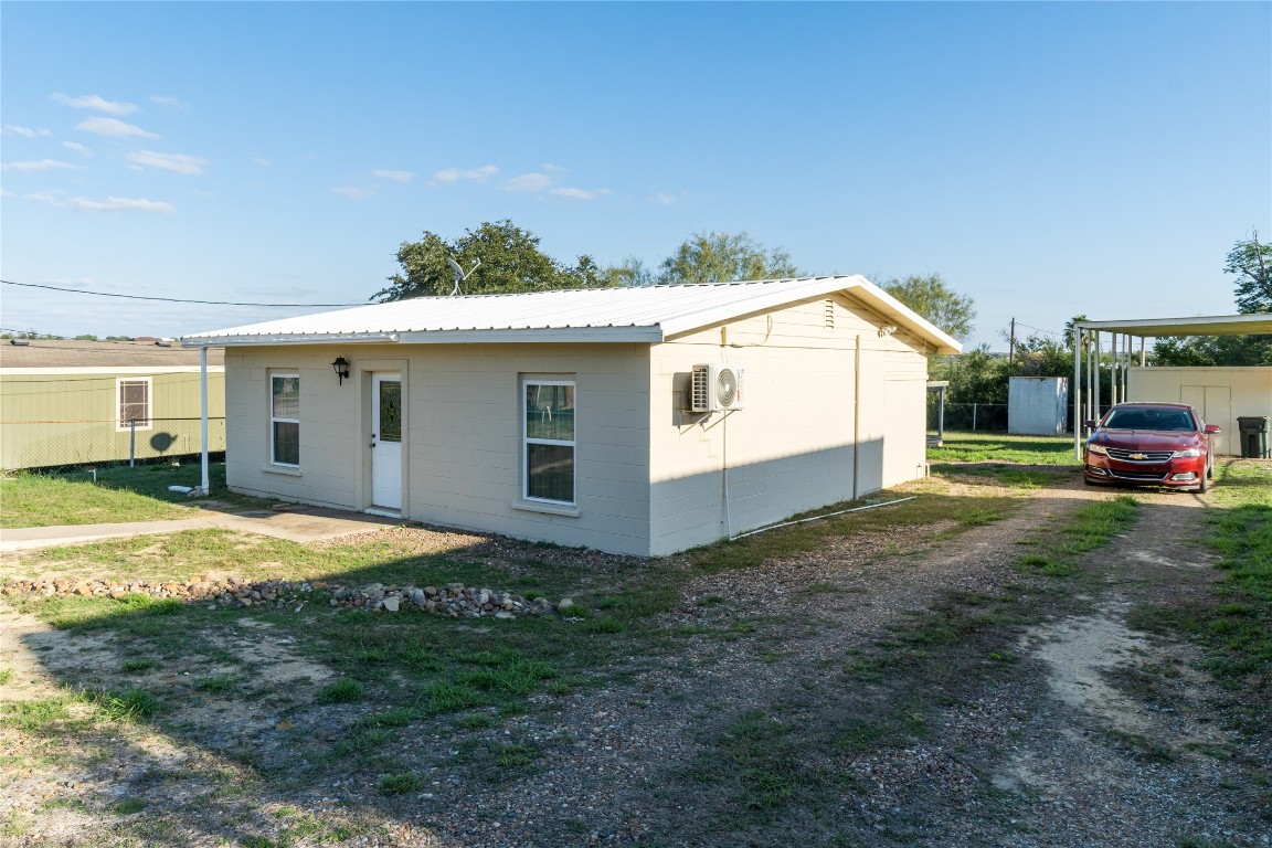 106 Overview Drive Zapata, TX 78076 - Photo 2 of 23 a view of a house with a yard and garage