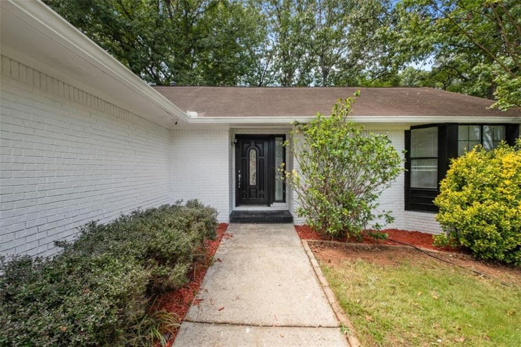 7519 Conkle Road Jonesboro, GA 30236 - Photo 2 of 35 a view of a house with potted plants