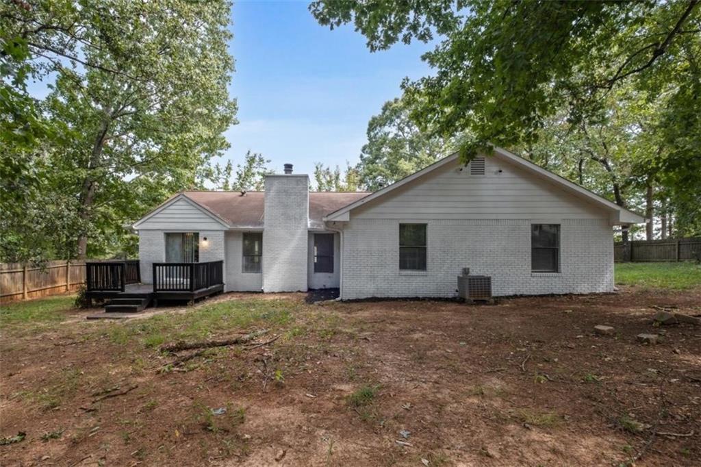 7519 Conkle Road Jonesboro, GA 30236 - Photo 27 of 35 a view of a house with a yard