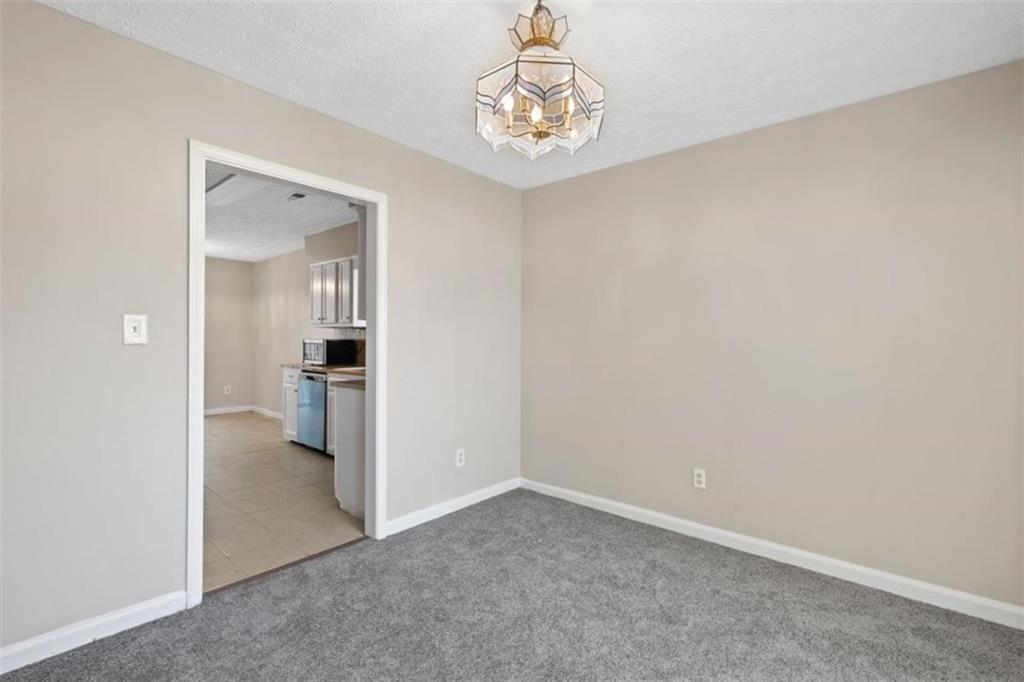 7519 Conkle Road Jonesboro, GA 30236 - Photo 7 of 35 wooden floor in a room