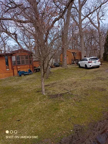 a house view with a garden space