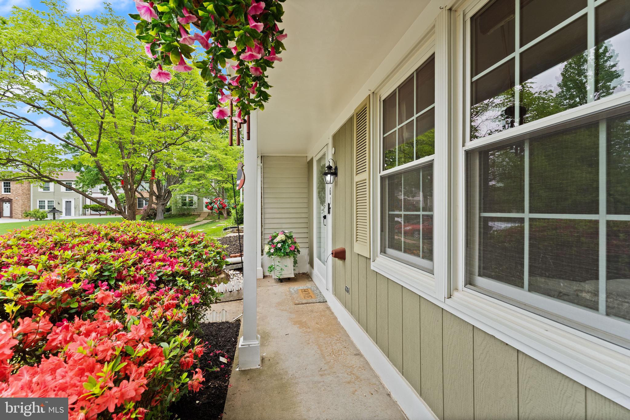 1617 Sierra Woods Drive Reston, VA 20194 - Photo 2 of 39 a view of a pathway with a flower garden