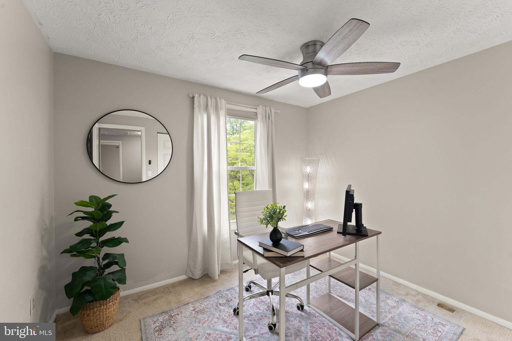 1617 Sierra Woods Drive Reston, VA 20194 - Photo 27 of 39 a workspace with furniture and a window
