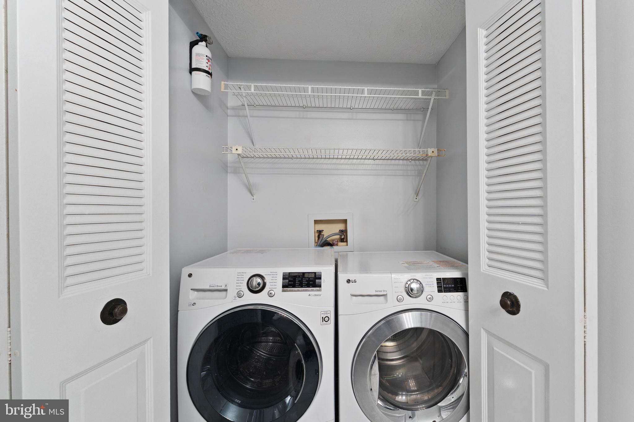 1617 Sierra Woods Drive Reston, VA 20194 - Photo 34 of 39 a view of a hallway with washer and dryer