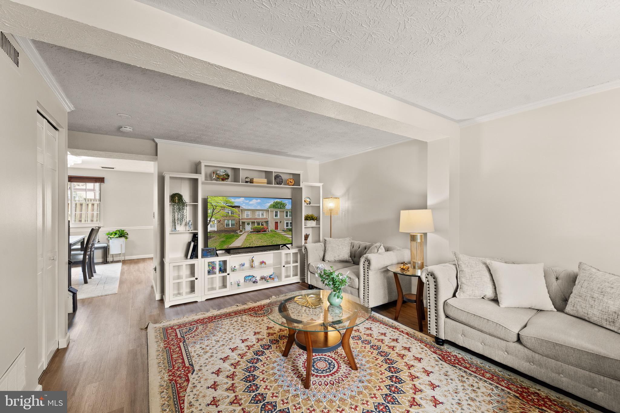 1617 Sierra Woods Drive Reston, VA 20194 - Photo 8 of 39 a living room with furniture and a large window
