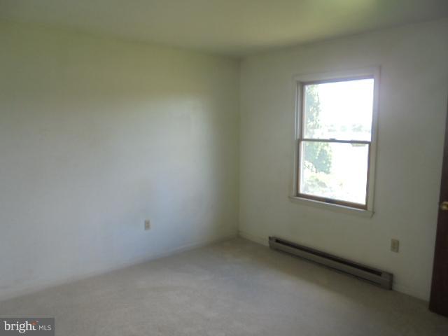 1721 Dudley Chance Road Millington, MD 21651 - Photo 14 of 21 an empty room with a window