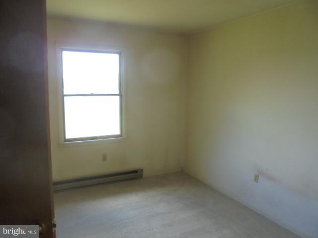 1721 Dudley Chance Road Millington, MD 21651 - Photo 16 of 21 an empty room with a window