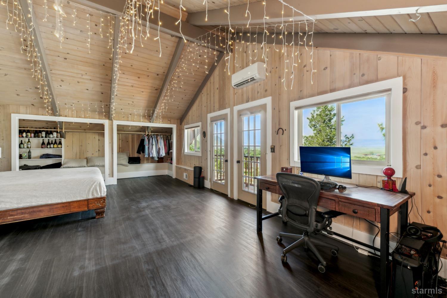 1299 Kingsbury Grade Road Gardnerville, NV 89460 - Photo 22 of 37 a bedroom with furniture and a window